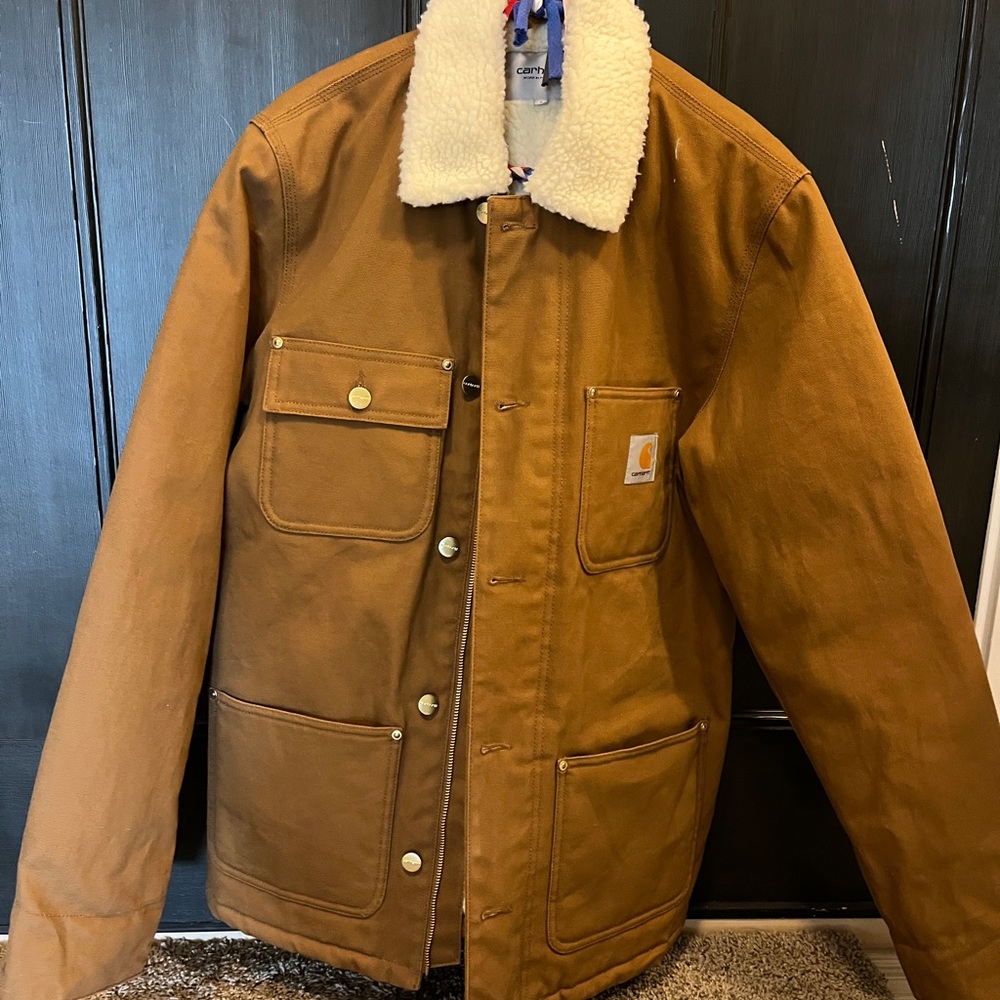 Carhartt “work in progress” size small jacket.